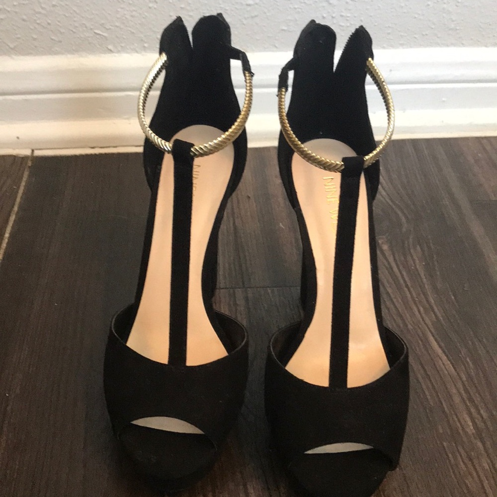 Nine West heels. I wore once for about an hour.